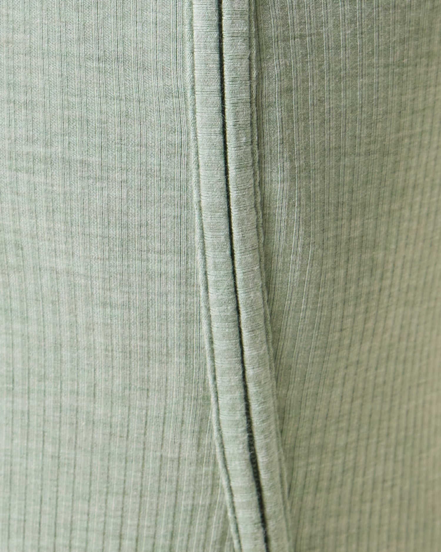 Close up of Baby wearing the Ribbed Bamboo Baby Pajama in Sage Heather