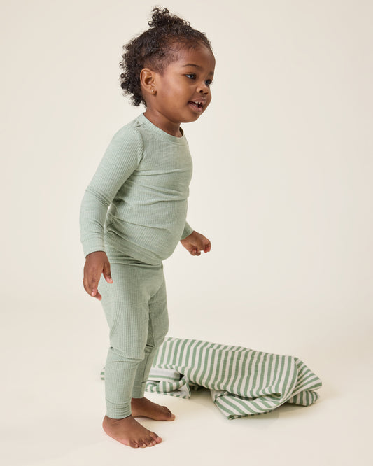 Baby wearing the Ribbed Bamboo Baby Two-Piece Pajama Set in Sage Heather@model_info:Harper is wearing 18-24 months.