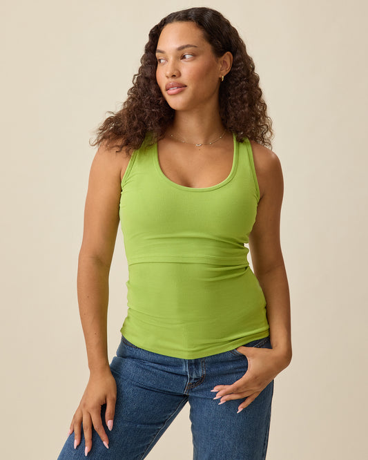 Model wearing Ribbed Bamboo Scoop Neck Nursing Tank in Avocado on a beige background @model_info:Mei is wearing a Small.