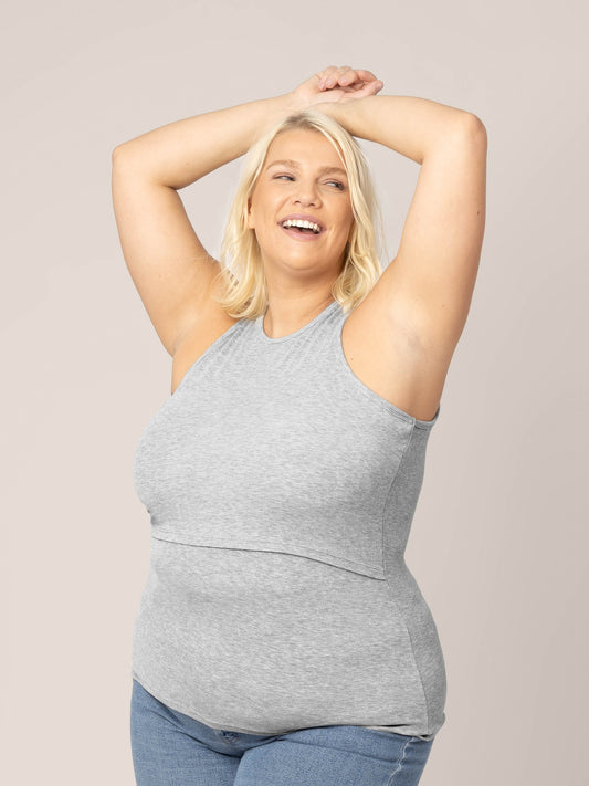 3/4 angle view of model in the Ribbed Bamboo Racerback Nursing Tank in grey heather @model_info:Lauren is wearing a 1X.
