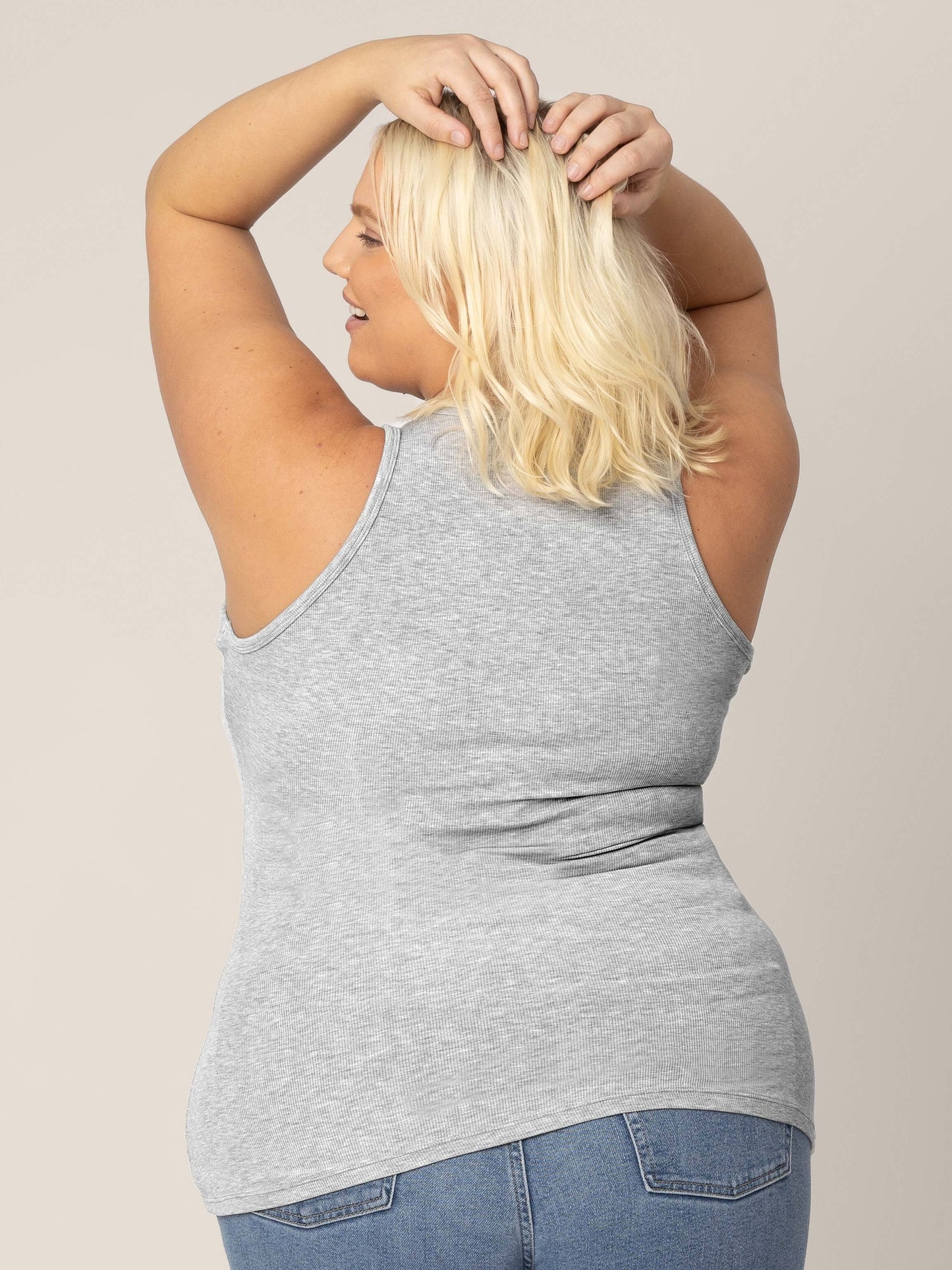Back view of model in the Ribbed Bamboo Racerback Nursing Tank in grey heather