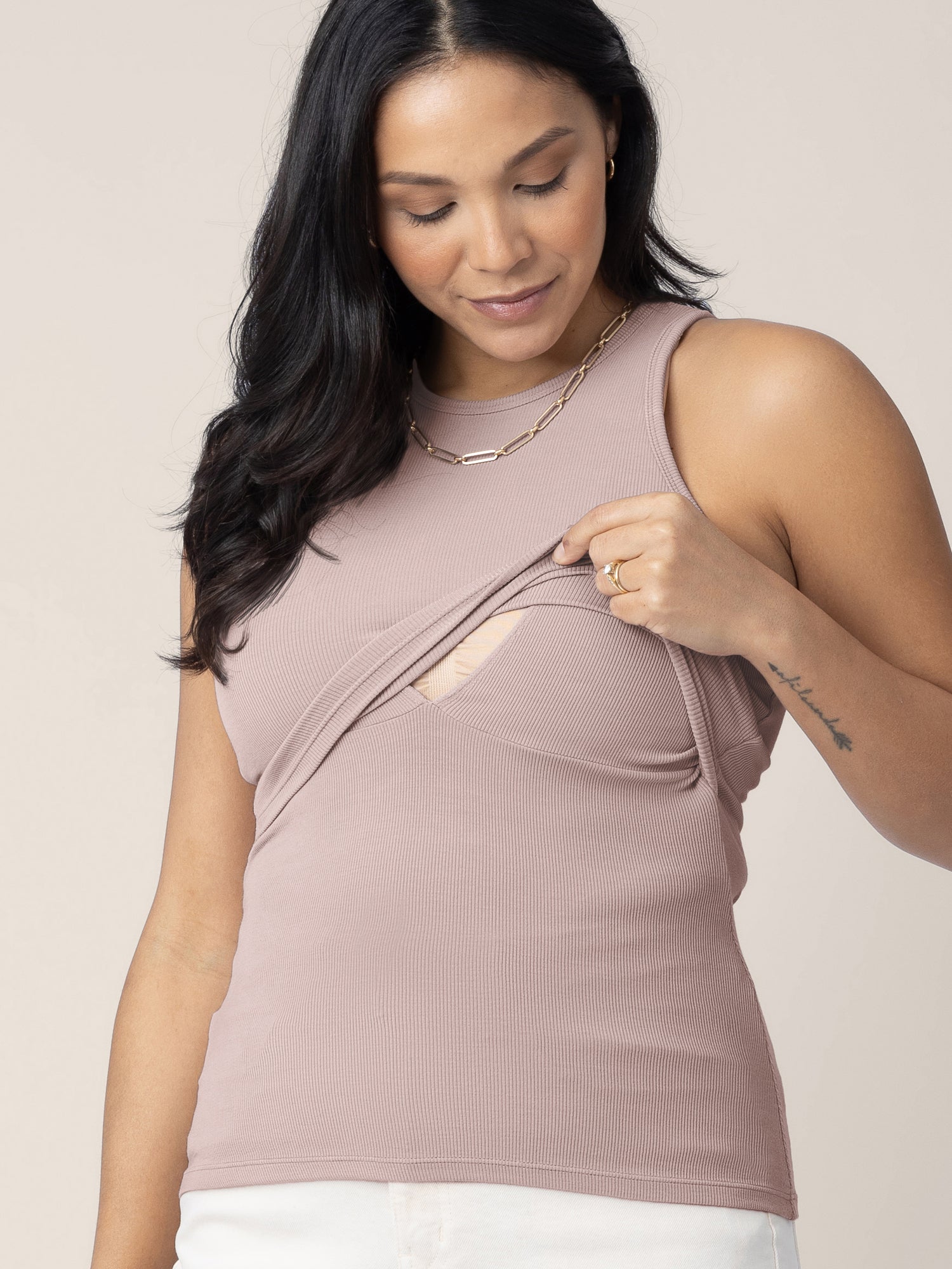 Close-up shot of the nursing access on the Ribbed Bamboo Racerback Nursing Tank in lilac stone, on model