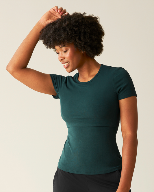 Front view of model wearing Ribbed Bamboo Crew Neck Nursing T-shirt in Evergreen@model_info:Kyra is wearing a Small.