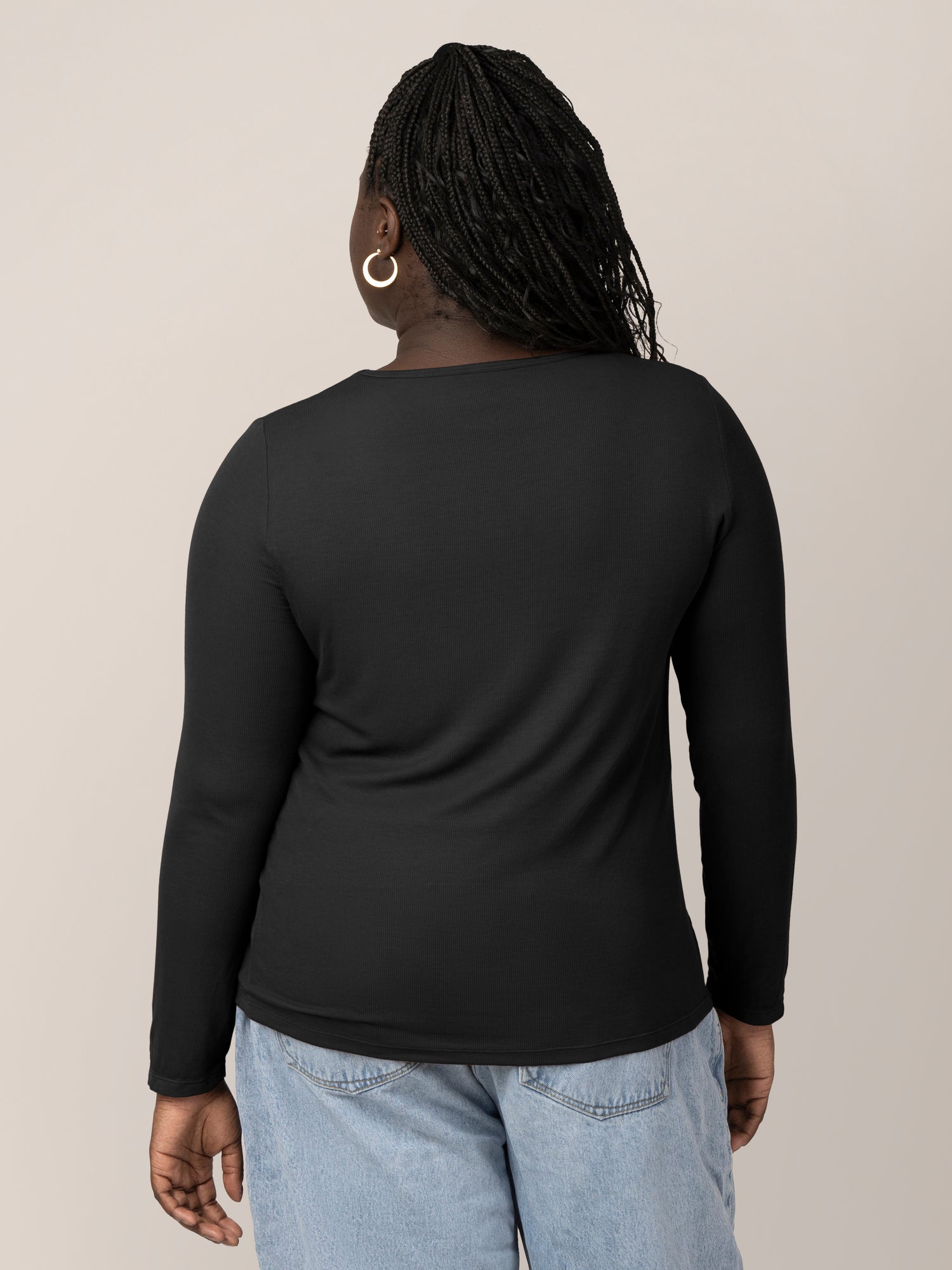 Back view of model wearing the Ribbed Bamboo Maternity & Nursing Long Sleeve T-shirt in Black
