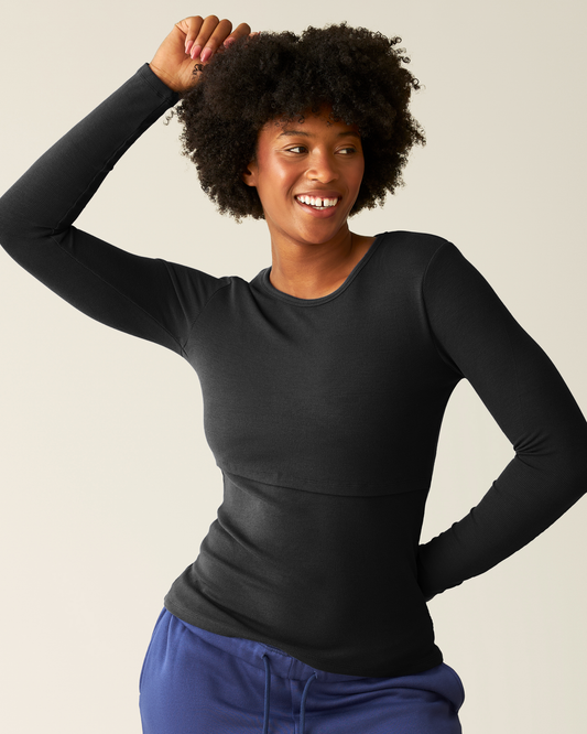 Woman wearing the Ribbed Bamboo Long Sleeve Nursing T-shirt in Black@model_info:Kyra is wearing a Small.