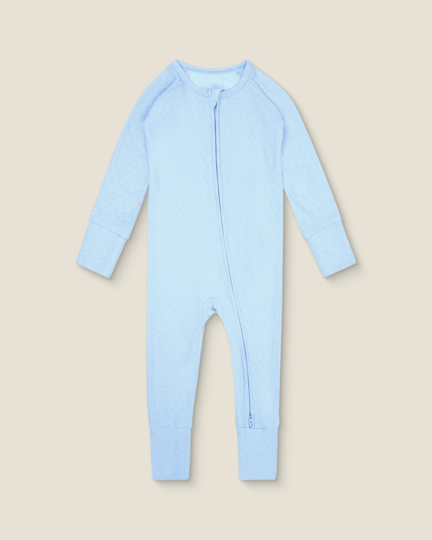 Blue ribbed bamboo baby onesie with a zipper on a light background