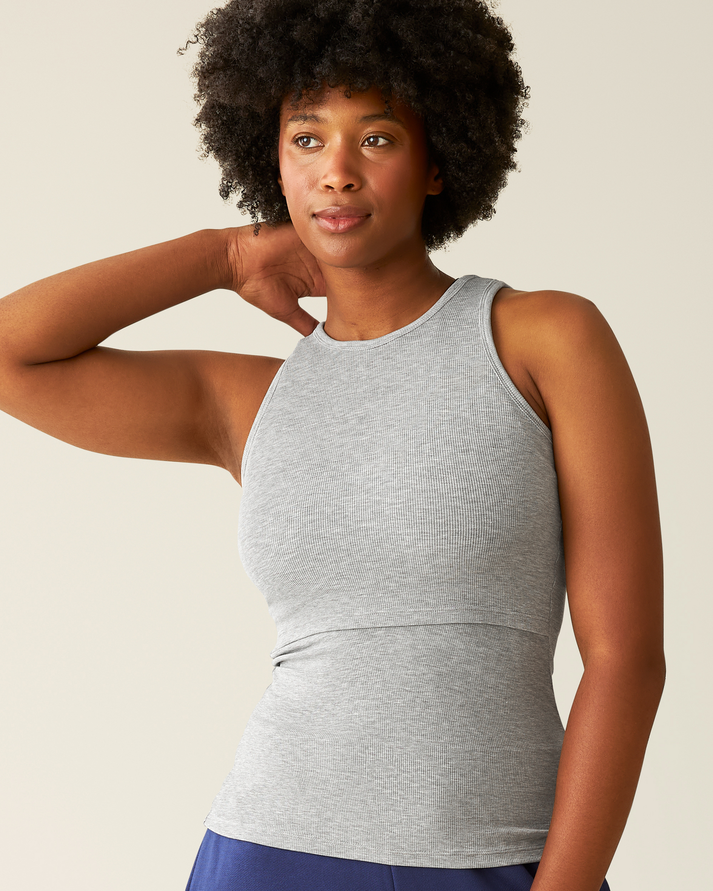 Woman wearing the Ribbed Bamboo Racerback Nursing Tank in Grey Heather