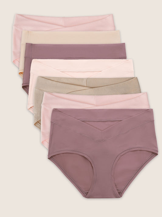 A collection of seven hipster style underwear in assorted colors beige, soft pink, and twilight