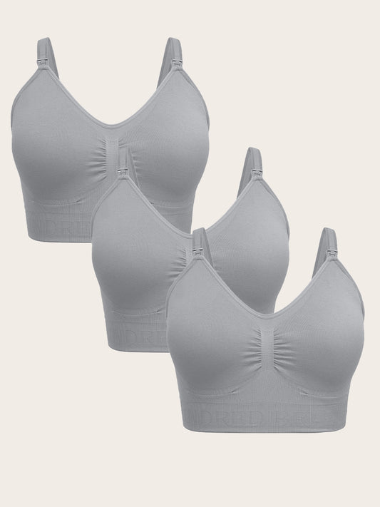 A Wash Wear Spare® Nursing Bra in Grey showing three Simply Sublime® Nursing Brain grey against a beige background