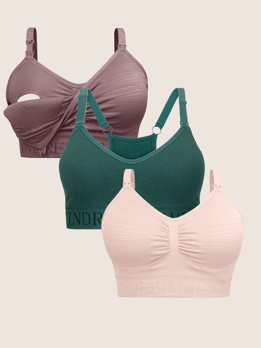 A Wash Wear Spare® Pumping Bundle with three bras, the Sublime® Hands-Free Pumping & Nursing Bra in twilight and pink heather and the Sublime® Hands-Free Pumping & Nursing Sports Bra in teal