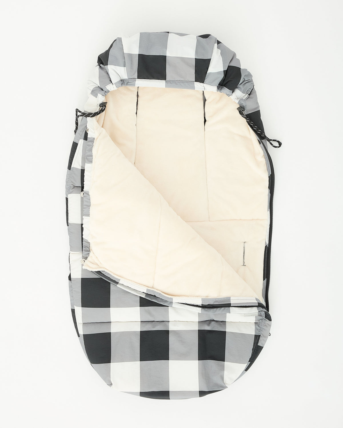 Cozy Stroller Footmuff in Buffalo Plaid, zipped open to see the warm fuzzy interior, on an off white background.