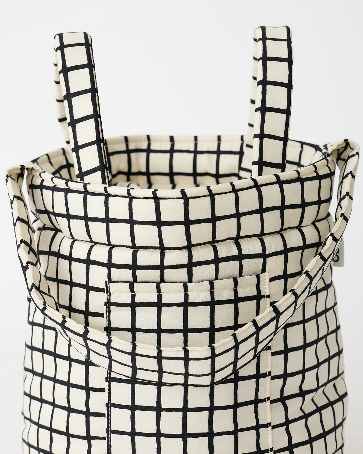 Stroller Party™ Bucket Bag in Black Grid sitting upright, on an off white background.