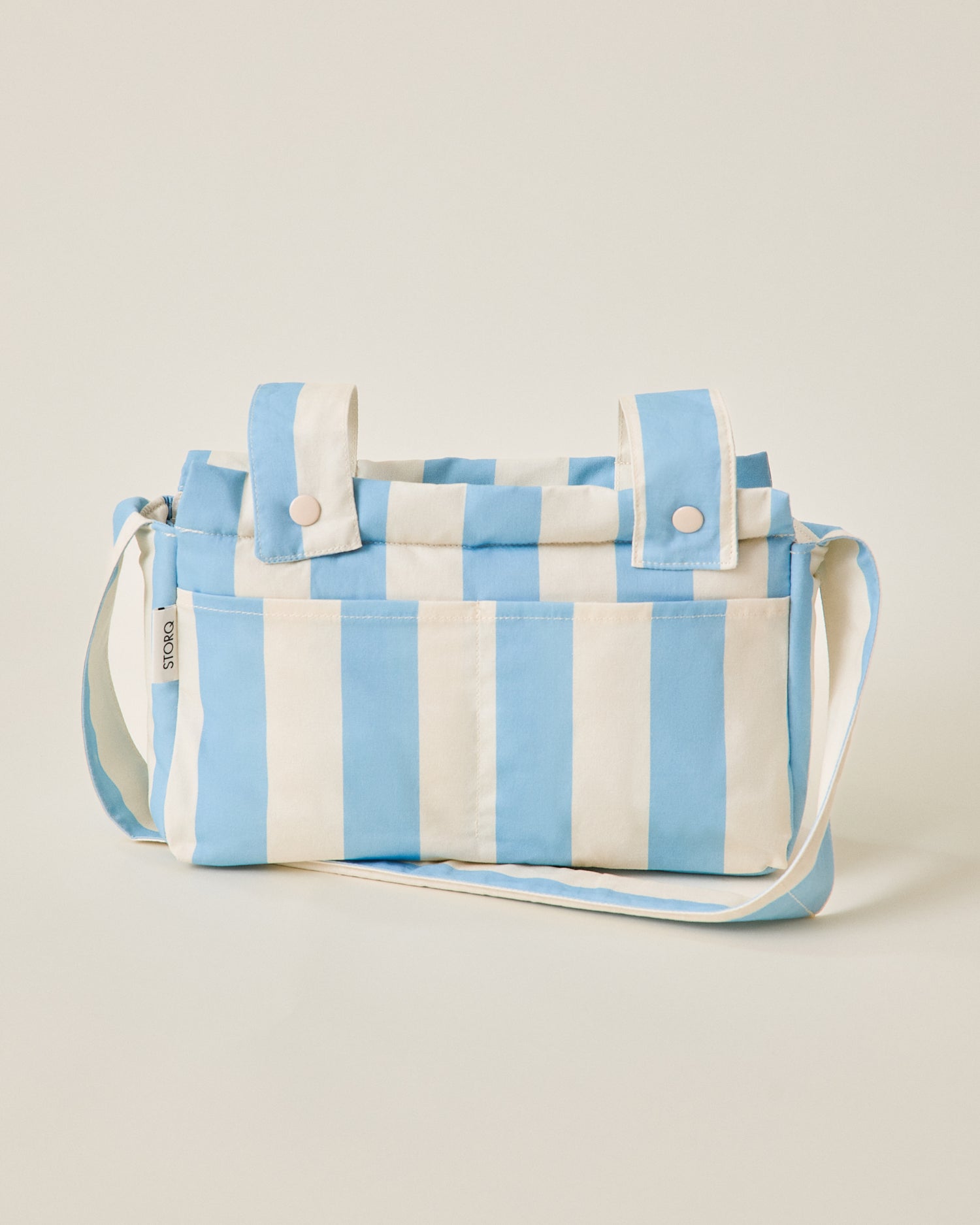 Stroller Party Caddy Bag in Blue Wide Stripe pattern on a beige background