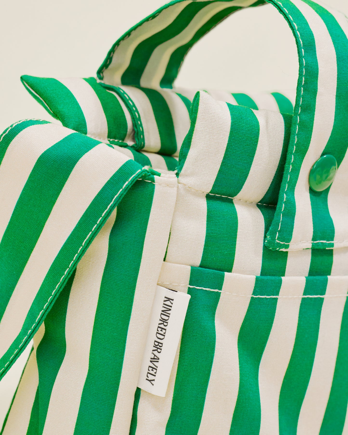 Close up of Stroller Party Caddy Bag in Green Stripe