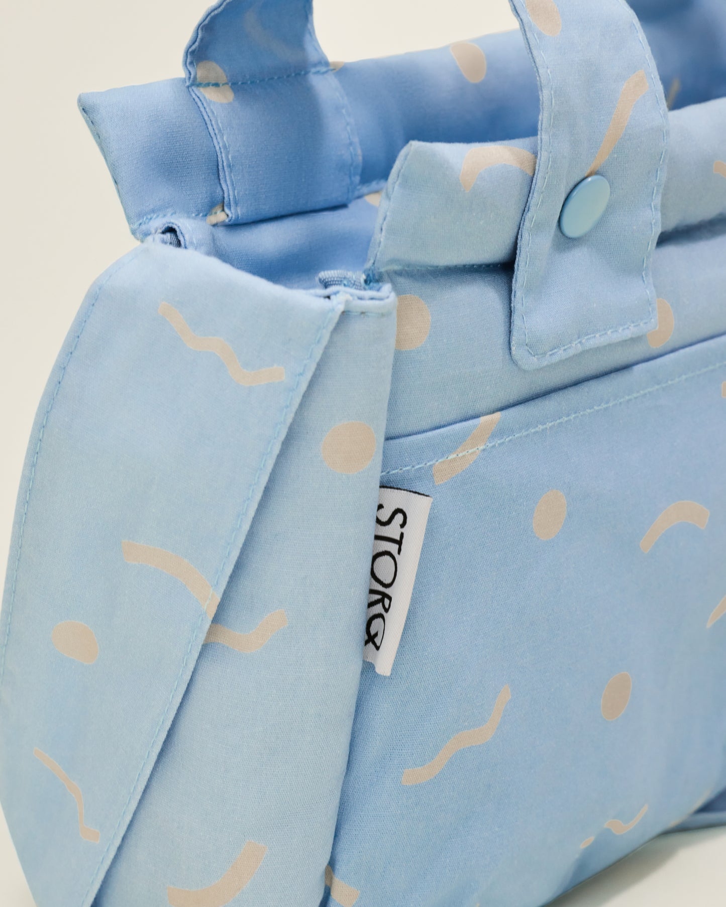 Close up of Stroller Party Caddy Bag in Sky Squiggles