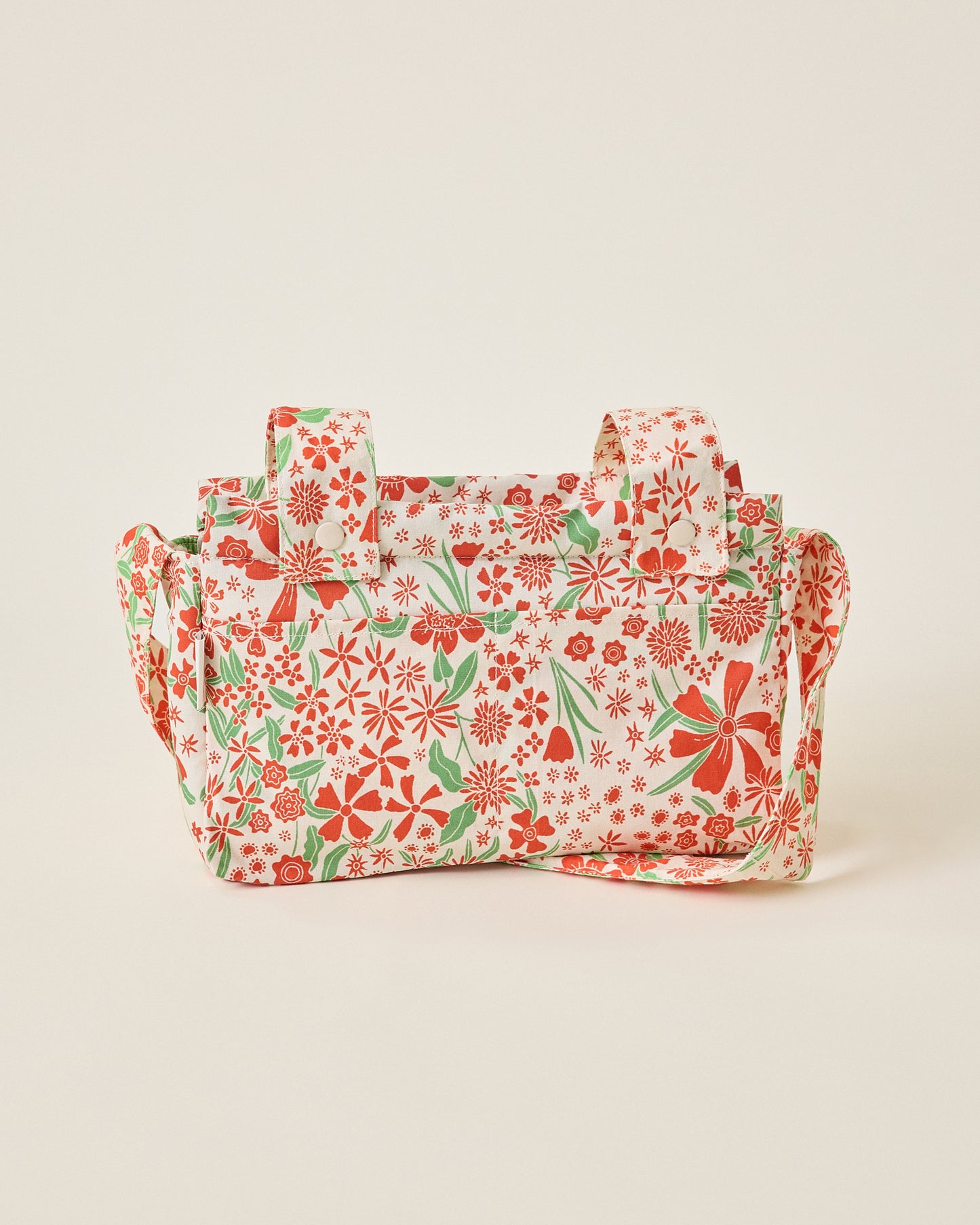 Stroller Party Caddy Bag in Superbloom on a beige background