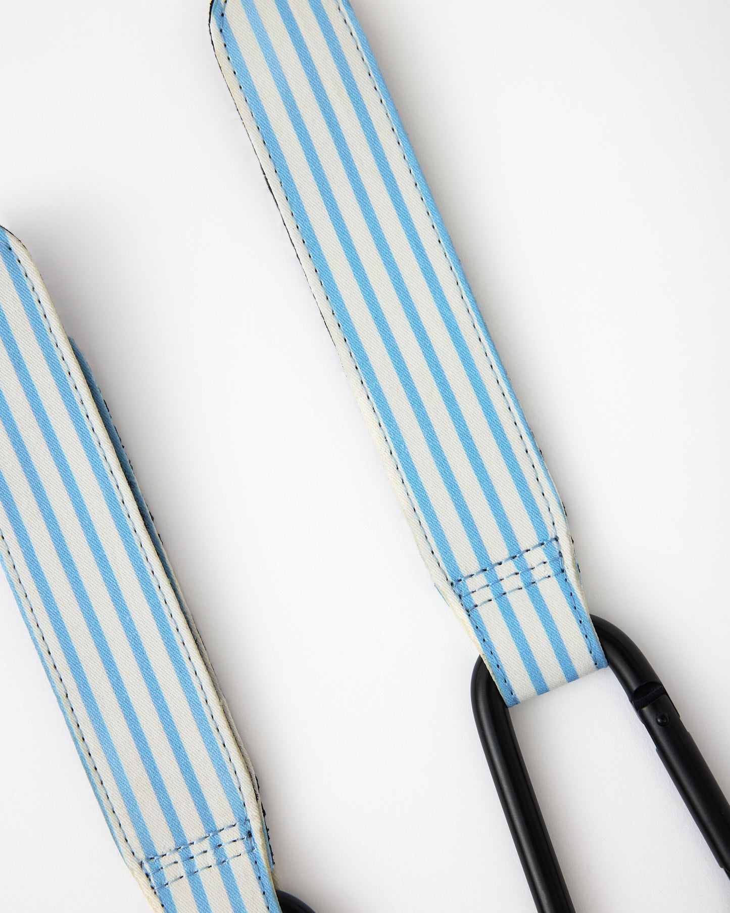 Close up of Stroller Party Clips (2-Pack) in Blue Pinstripe on a white background.