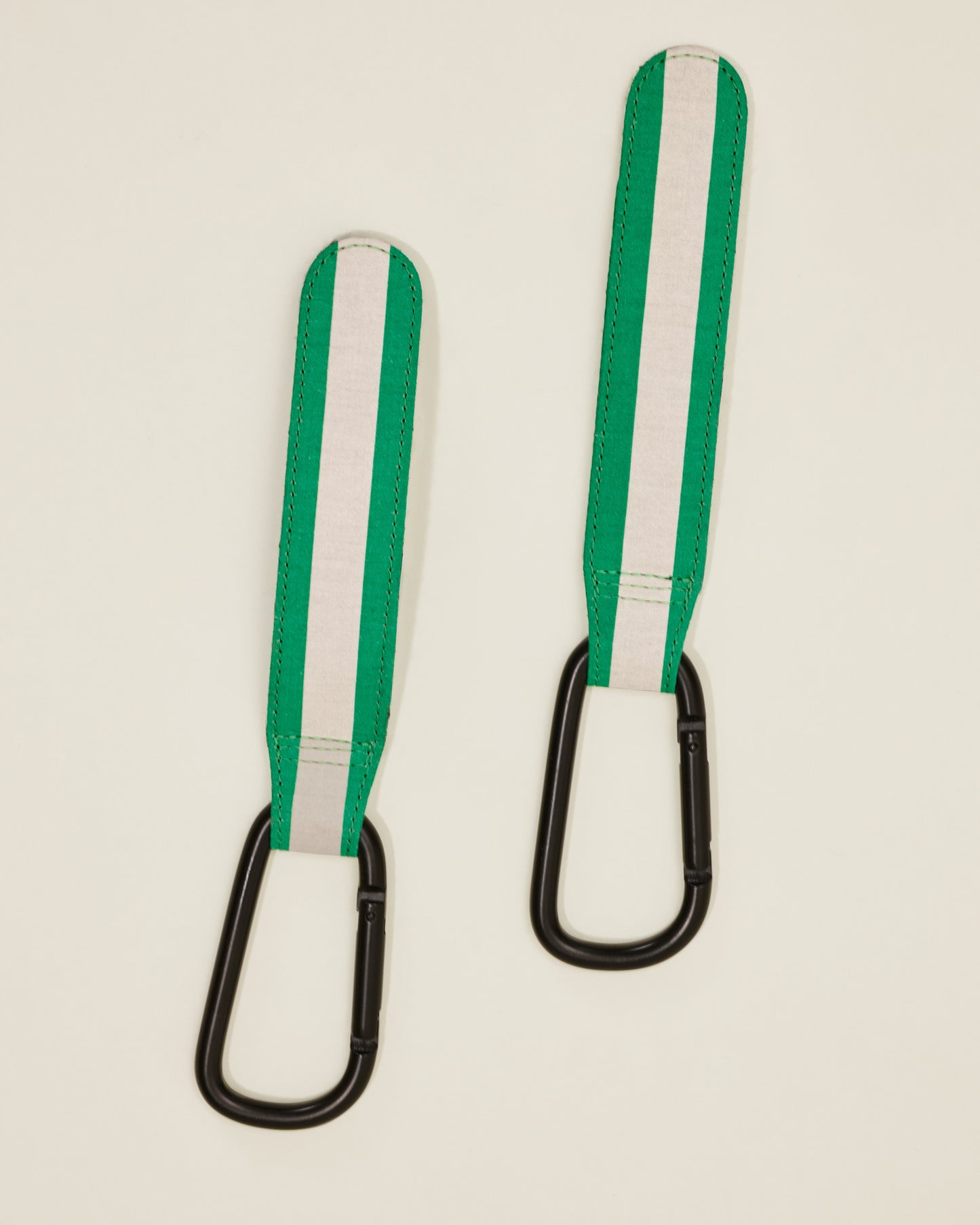 Stroller Party Clips in Green Stripe, on a neutral background