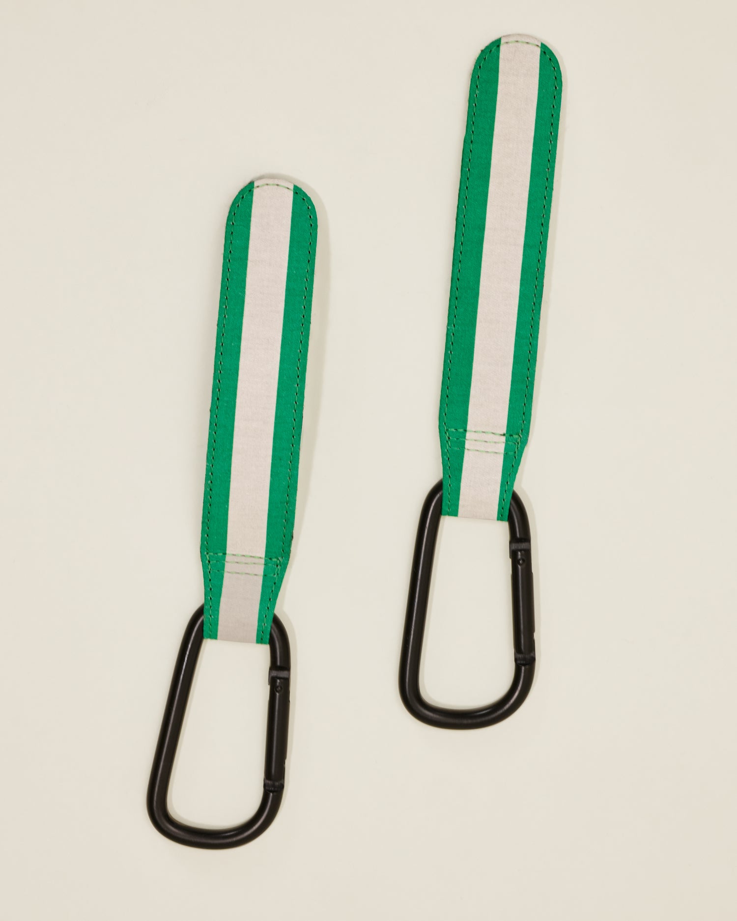 Stroller Party Clips in Green Stripe, on a neutral background