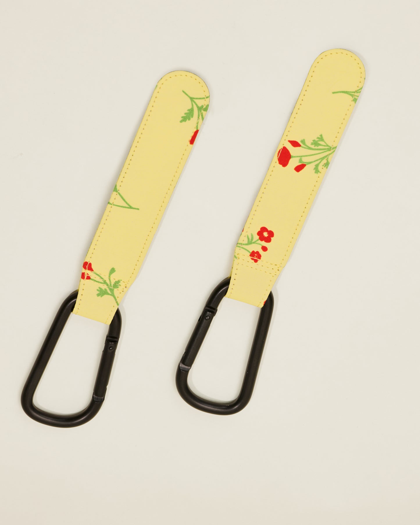 Stroller Party Clips in Sunshine Wildflower, on a neutral background