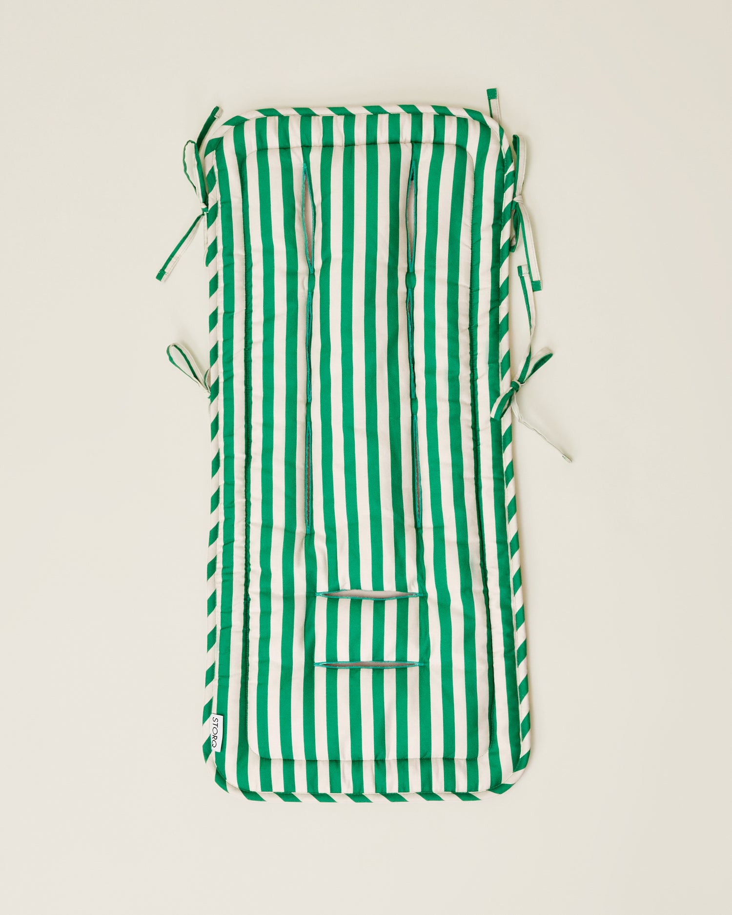 Stroller Party Seat Liner in Green Stripe on a neutral background