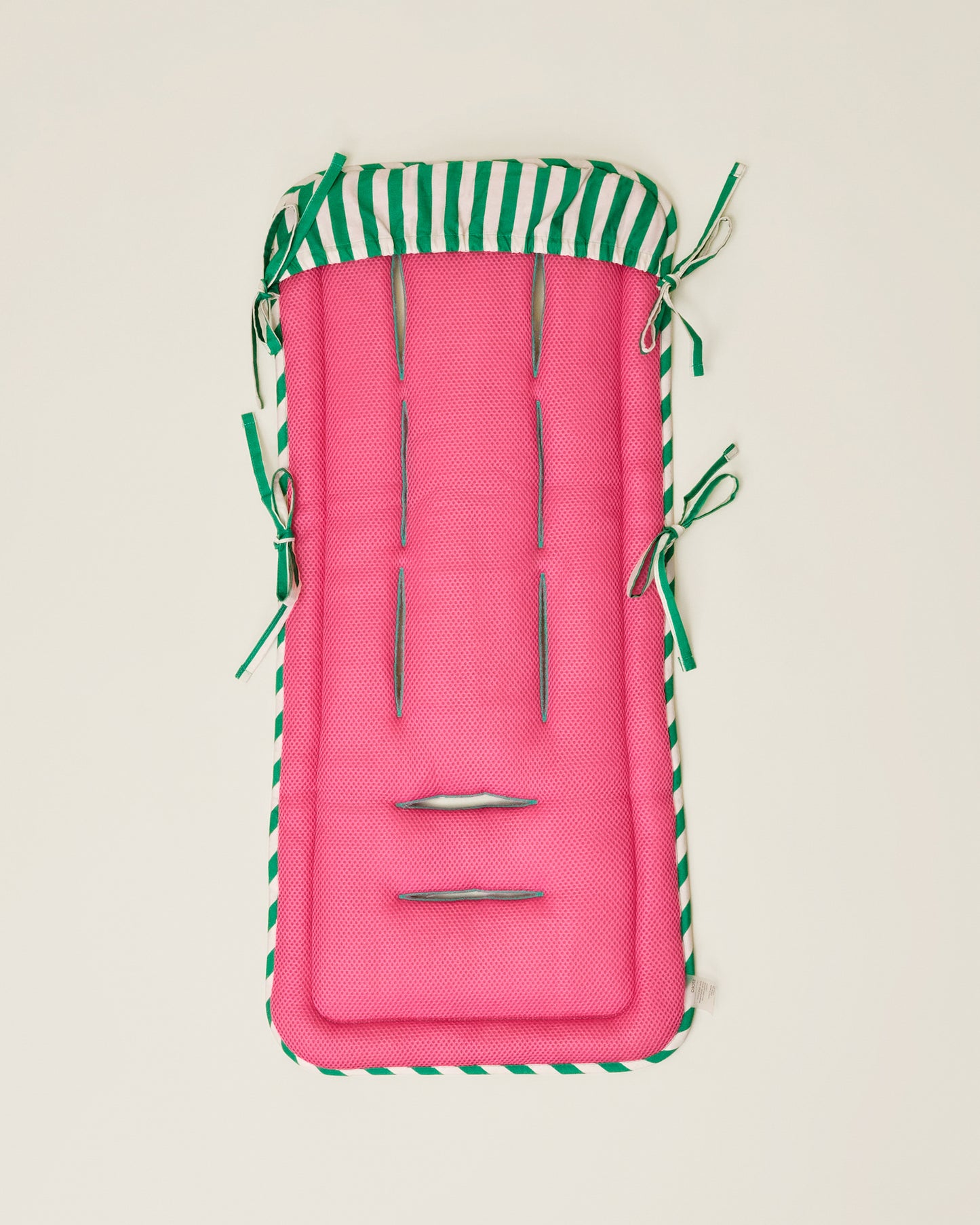Stroller Party Seat Liner in Green Stripe on a neutral background, showing the back of the seat liner
