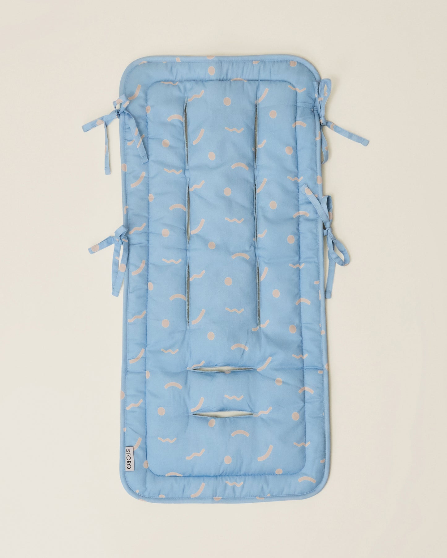 Stroller Party Seat Liner in Sky Squiggles on a neutral background
