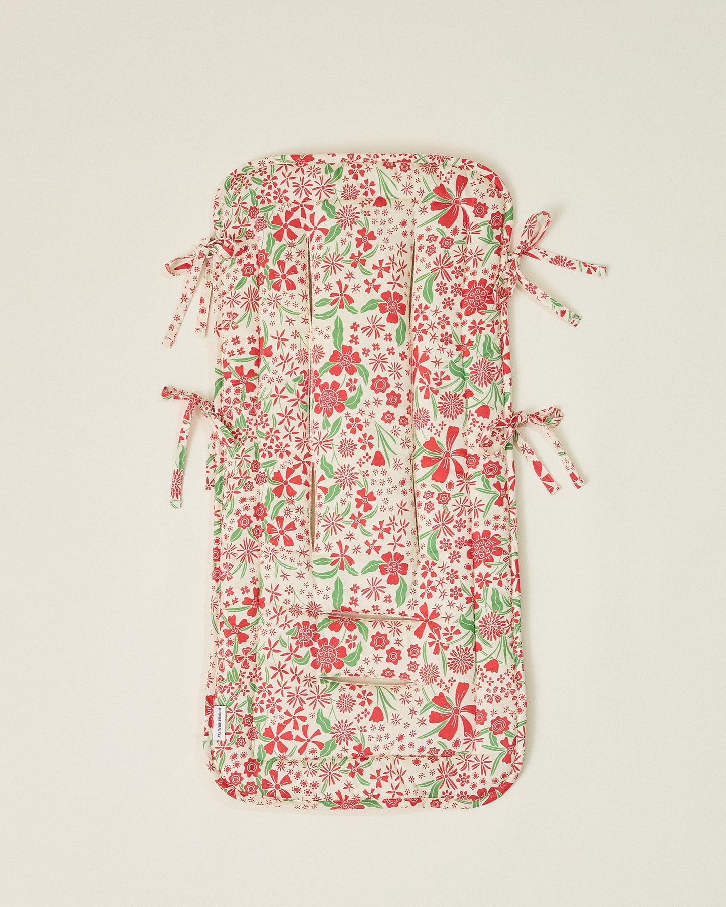 Stroller Party Seat Liner in Superbloom on a neutral background