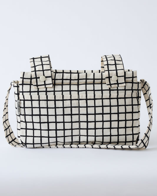 Stroller Party™ Caddy Bag in Black Grid, on a beige background.