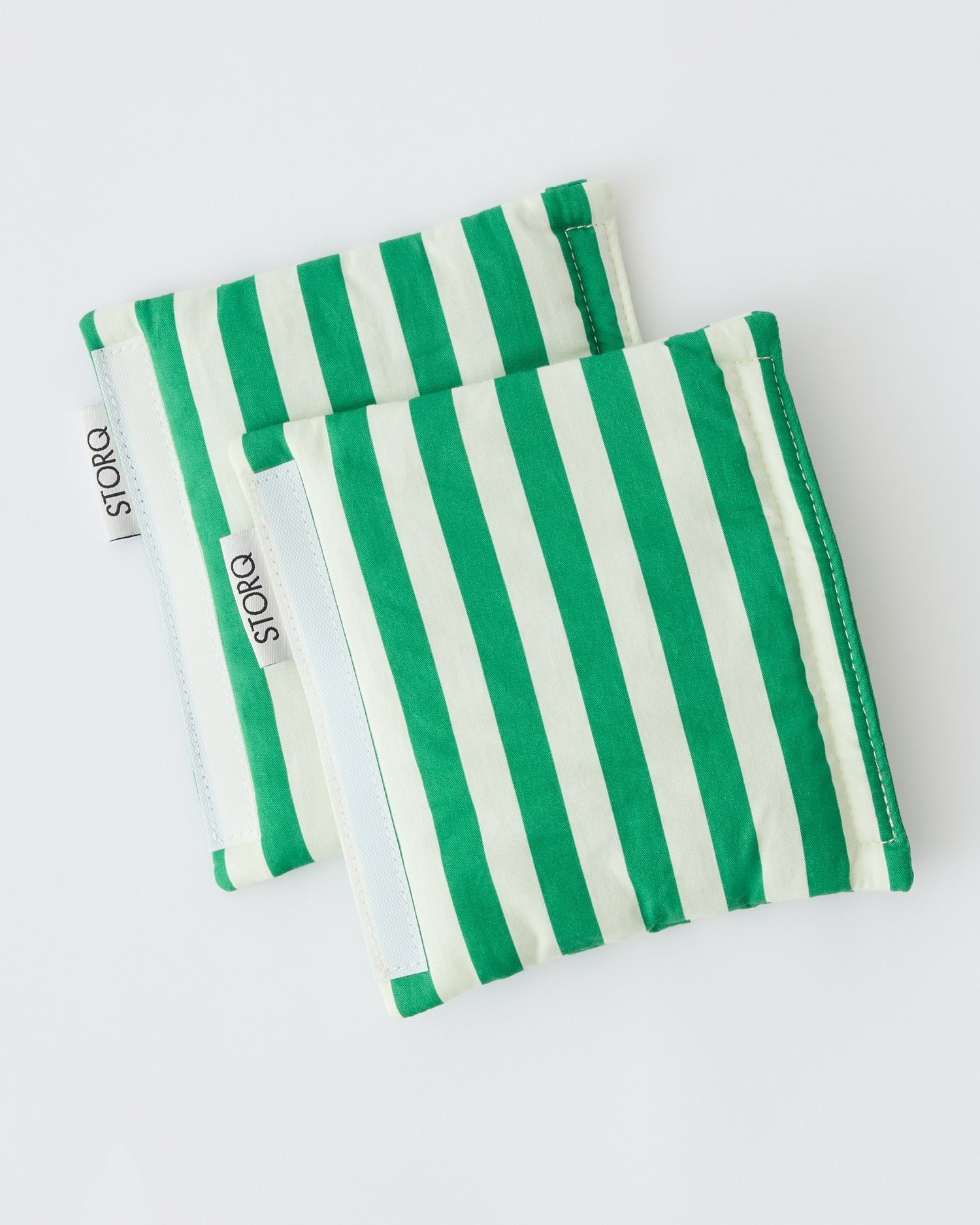 Unfolded Stroller Party™ Seat Liner & Strap Covers in Green Stripe on a beige background.