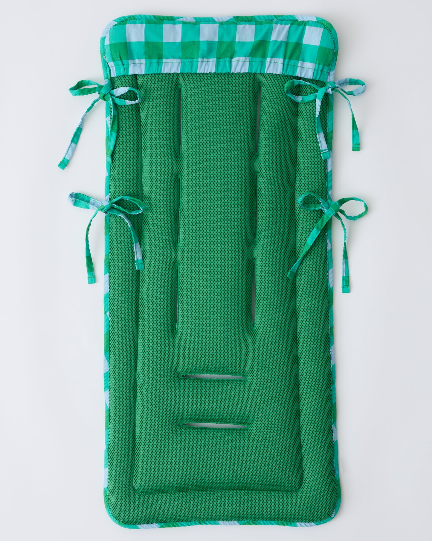 Back side to show the cover and cushion of Stroller Party™ Seat Liner in Teal Gingham on a beige background.