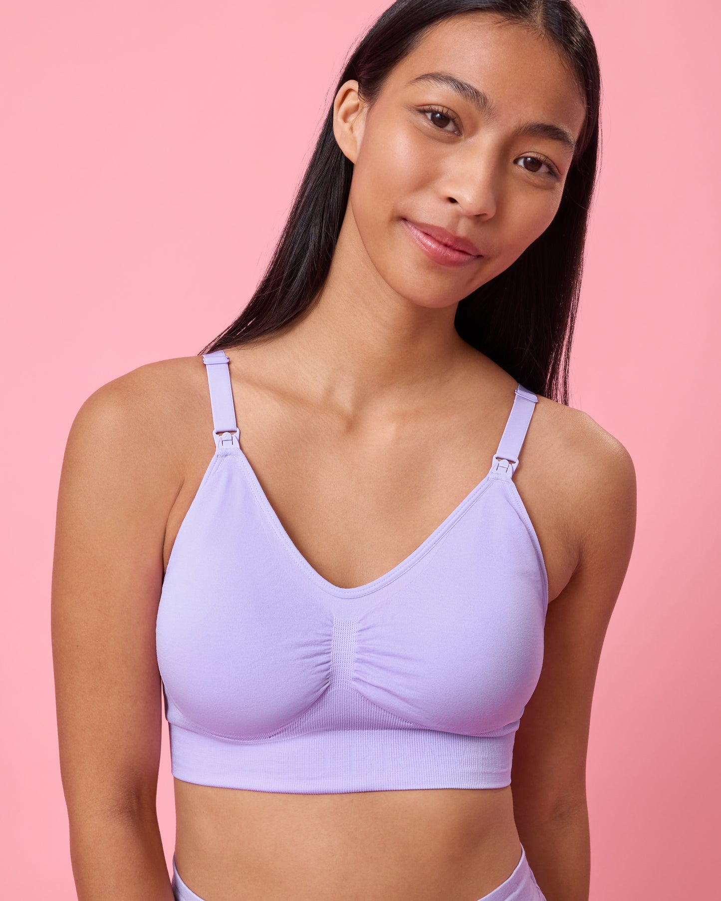 Front view of model wearing Simply Sublime Nursing Bra in Lavender on a pink background@model_info:Charissa is wearing a Small.