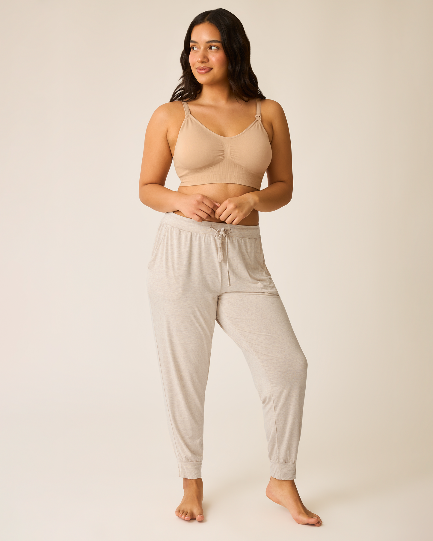 Model wearing the Everyday Lounge Jogger in Oatmeal Heather with beige bra