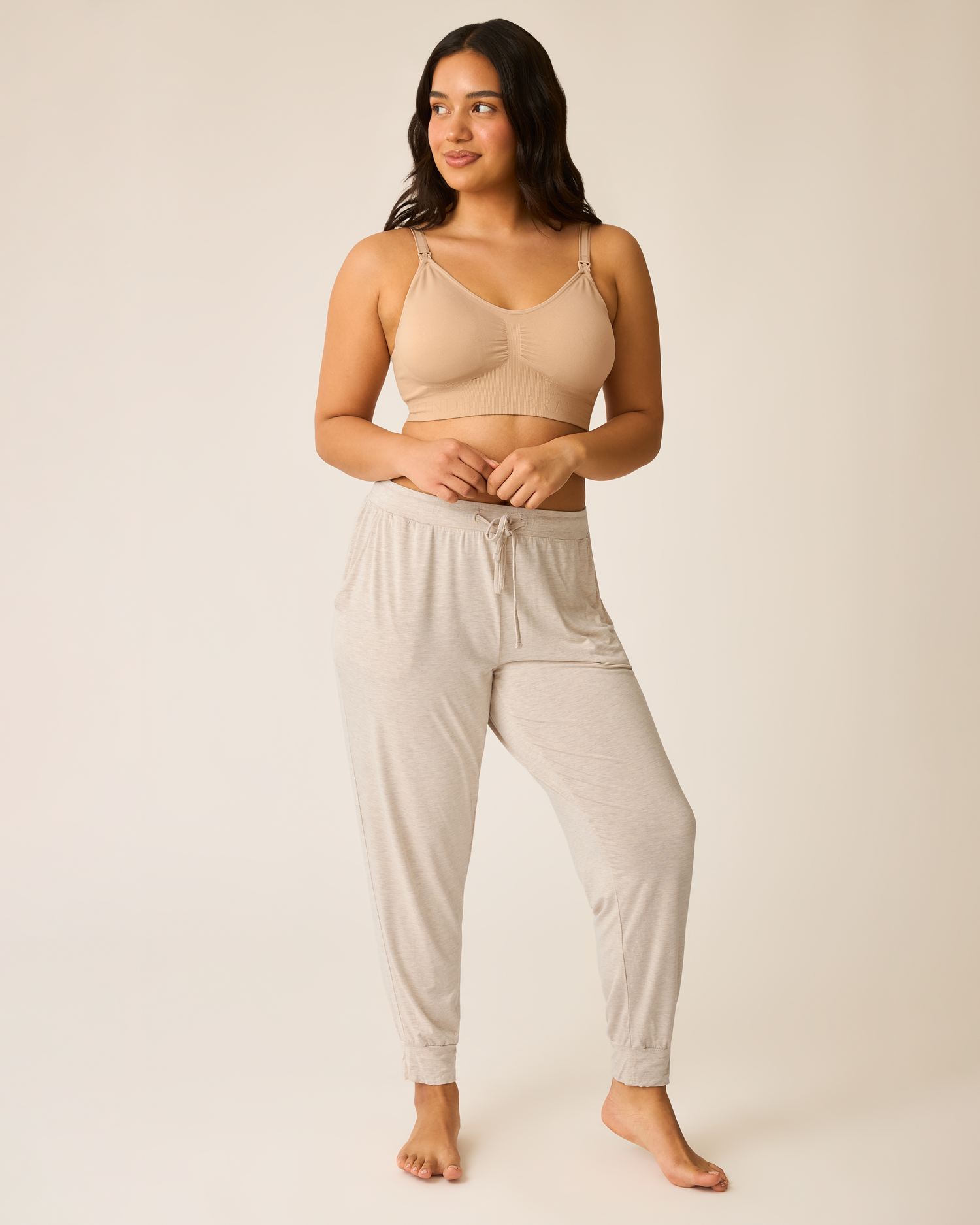 Model wearing the Everyday Lounge Jogger in Oatmeal Heather with beige bra