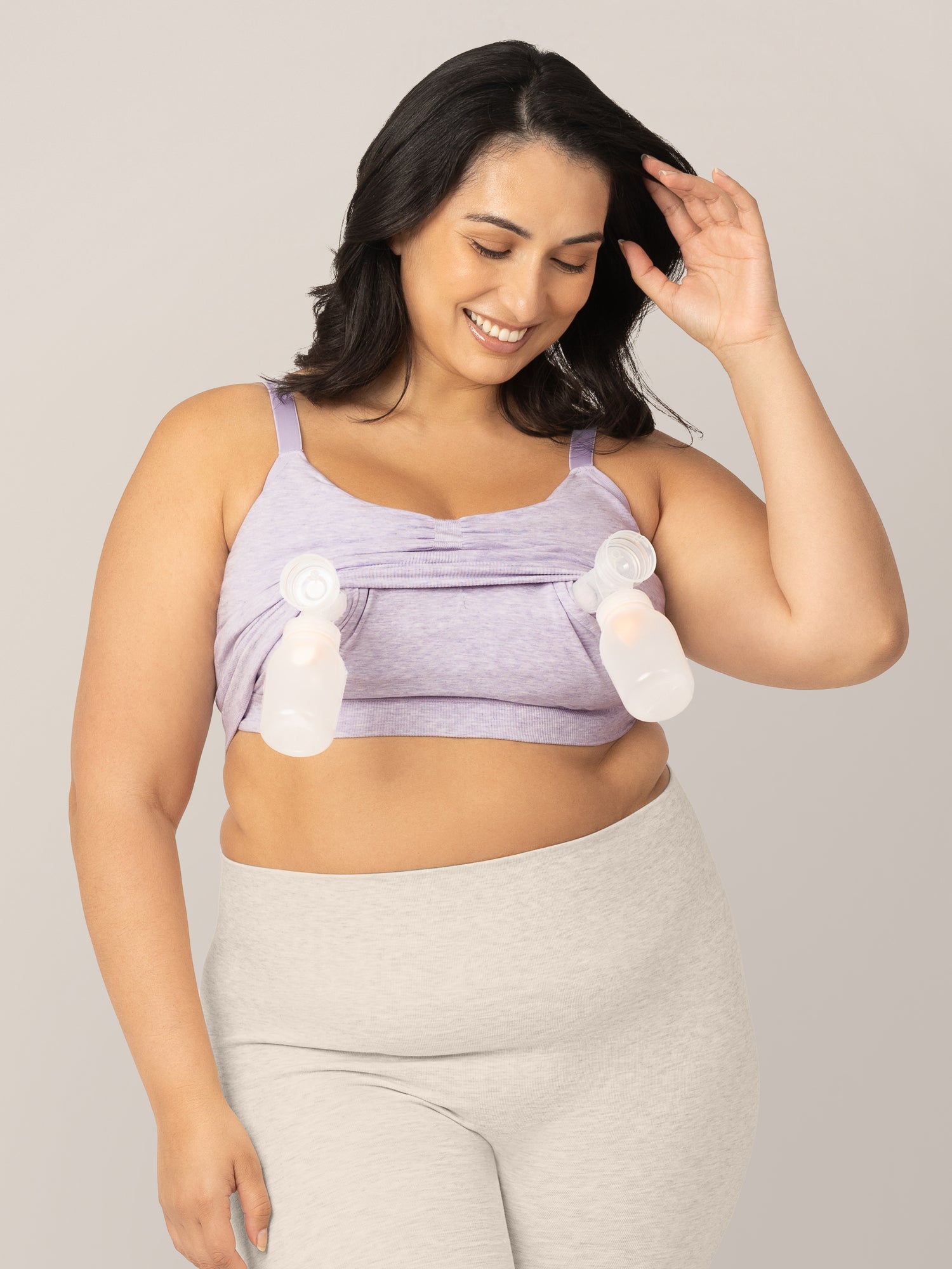 Front view of model wearing the Sublime® Bamboo Hands-Free Pumping Lounge & Sleep Bra in Lavender Heather with two pump flanges