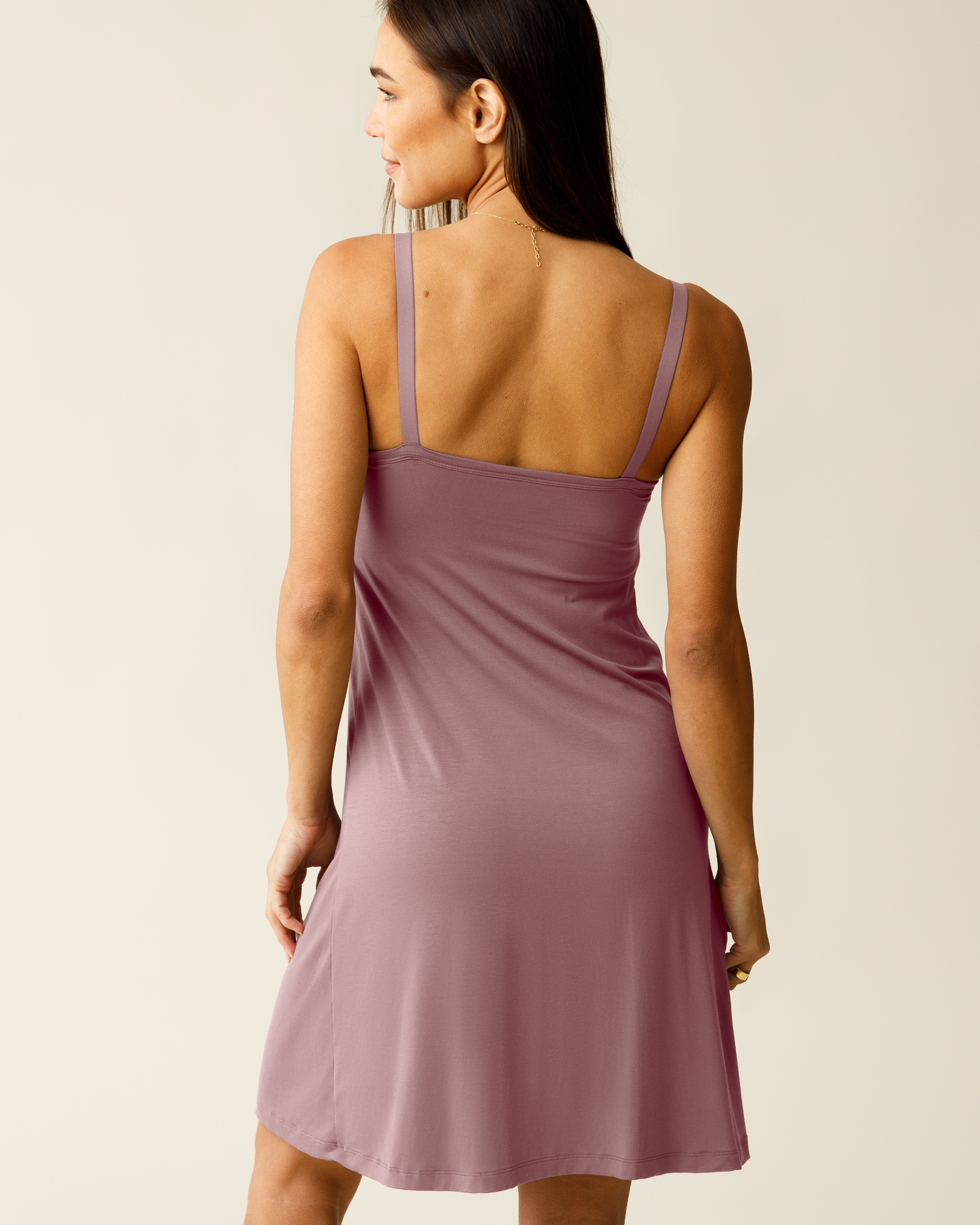 Back view of woman wearing Stella Hands-Free Pumping & Nursing Nightgown in Twilight against a plain background