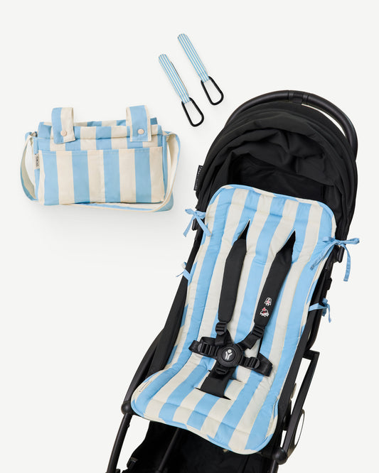 The Stroller Party Seat Liner, Stroller Party Clips (Two-Pack), and the Stroller Party Caddy Bag of the Stroller Party Set in Blue Wide Stripe on a white background
