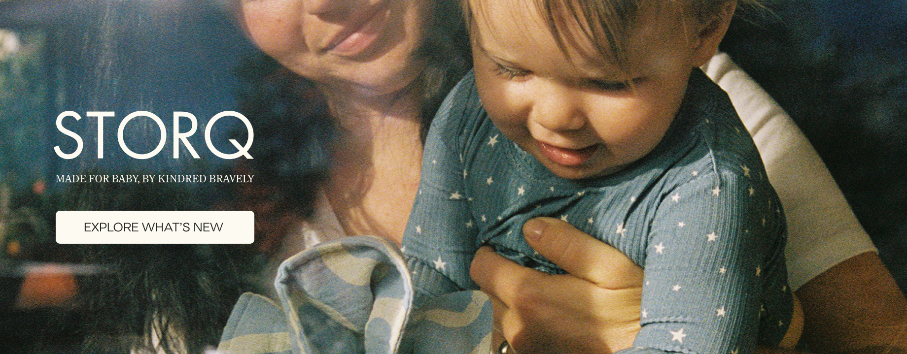 Image of woman holding baby with text overlay STORQ