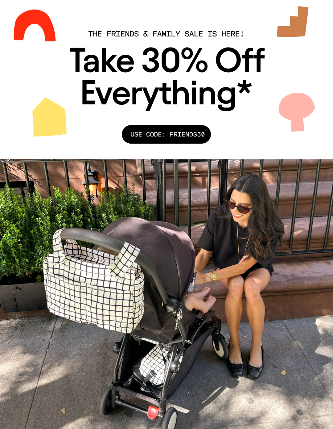 A promotional banner split into two sections: the top features a large sale text graphic reading 'Take 30% Off Everything*' with a 'Use Code: FRIENDS15' button, and the bottom shows a woman sitting on a sidewalk next to a black stroller with the Stroller Party™ Caddy Bag in Black Grid.
