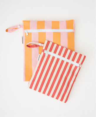 Wet/Dry Bag Set in Pink Stripe on a beige background