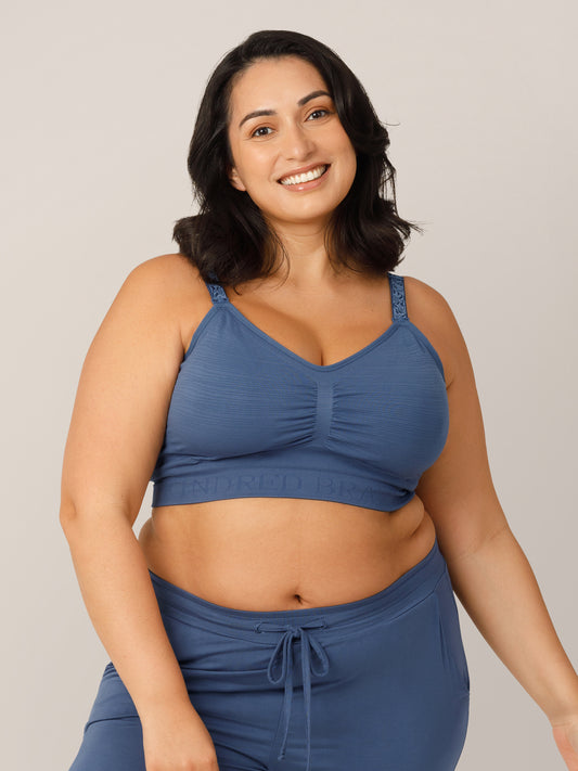 Front view of model wearing the Sublime® Hands-Free Pumping & Nursing Bra in Slate Blue in a Busty fit. @model_info:Connie is wearing an X-Large Busty.