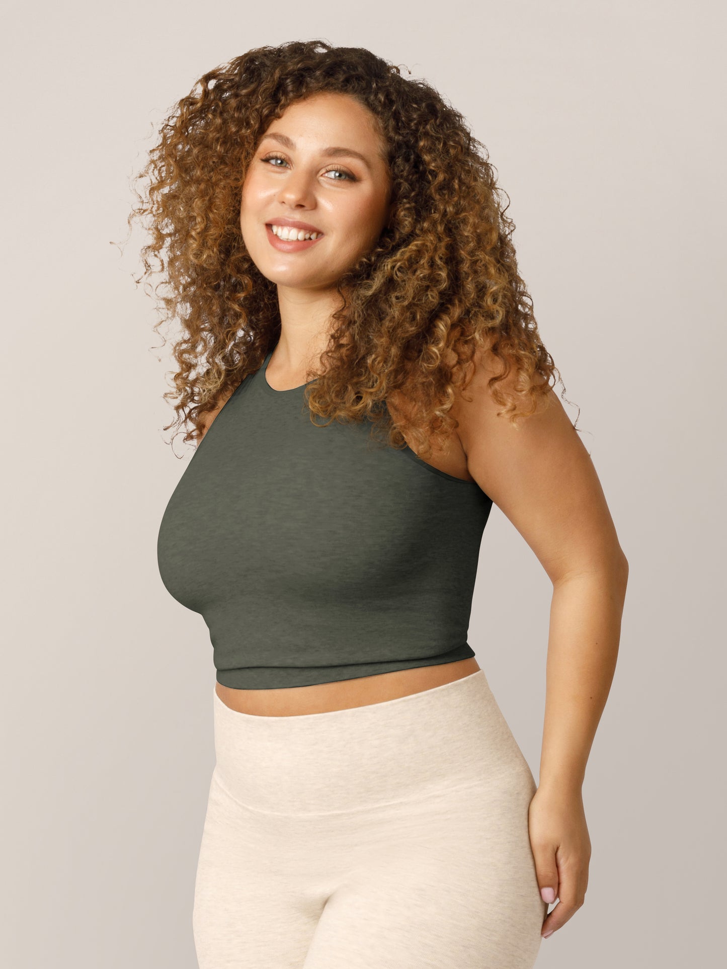 3/4 view of model wearing the Sublime® Bamboo Maternity & Nursing Longline Bra in Olive Heather @model_info:Ceira is wearing a Medium Busty.