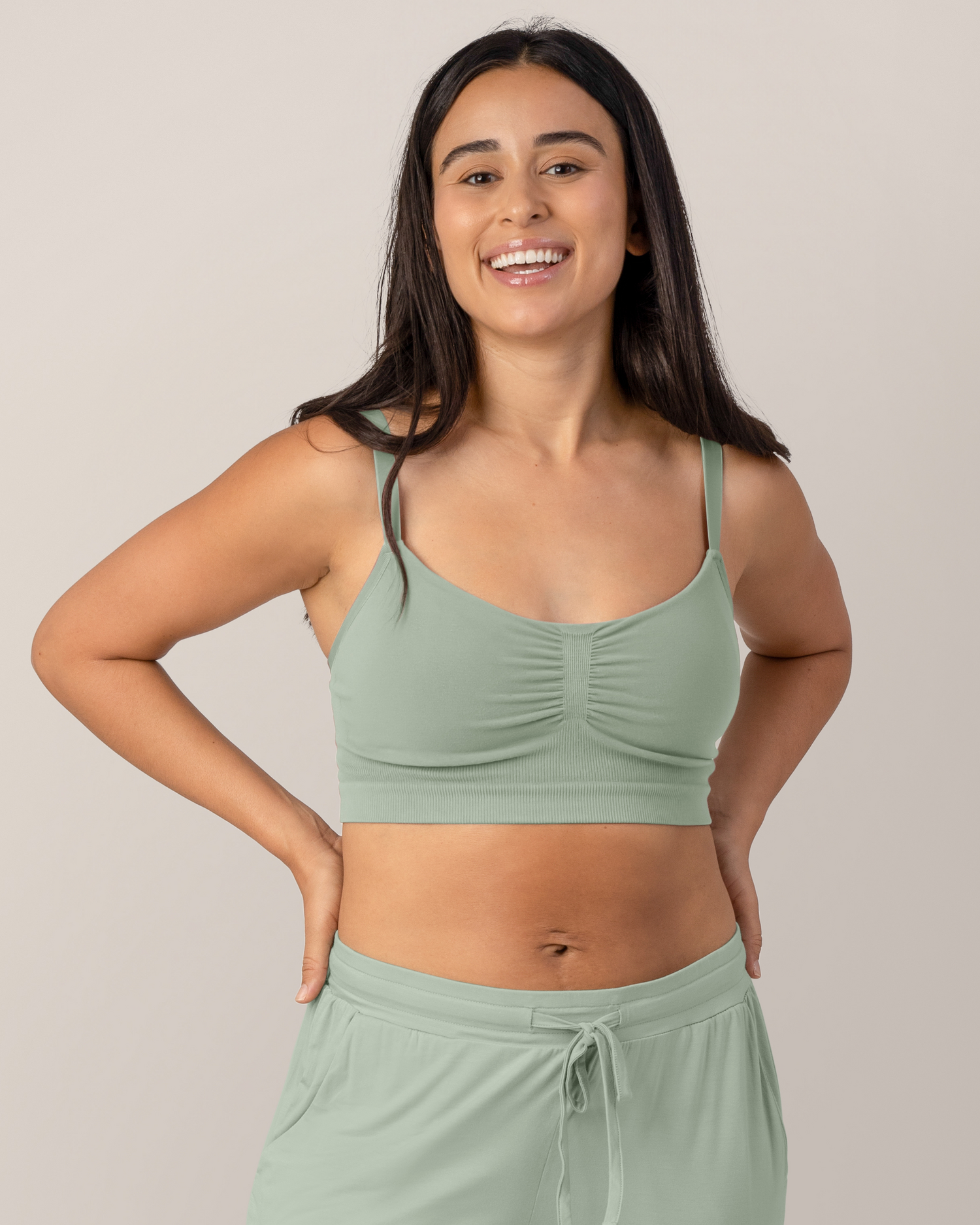 Front view of model Model wearing the  Sublime® Bamboo Hands-Free Pumping Lounge & Sleep Bra in Aqua Mist@model_info:Anamaria is wearing a Medium.