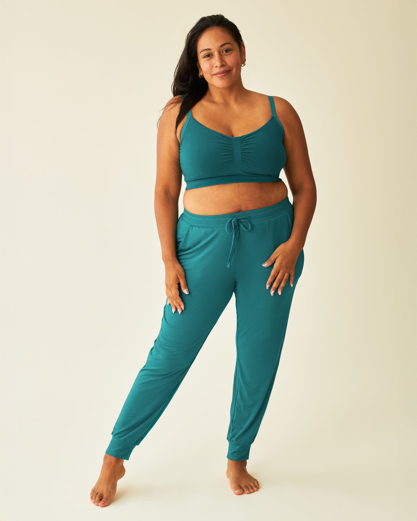 Model wearing the Everyday Lounge Jogger in Bright Teal @model_info:Lily is 5'5" and wearing a Large.