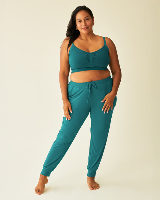 Model wearing the Everyday Lounge Jogger in Bright Teal @model_info:Lily is 5'5" and wearing a Large.