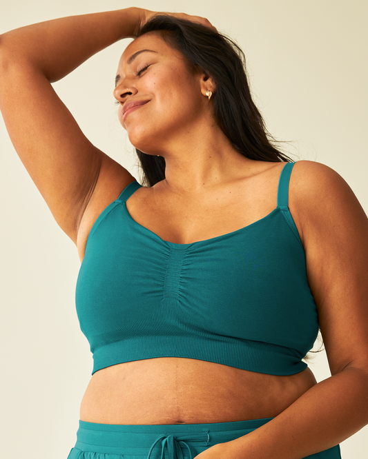 Model wearing Sublime® Bamboo Hands-Free Pumping Lounge & Sleep Bra in Bright Teal @model_info:Lily is wearing a Large.