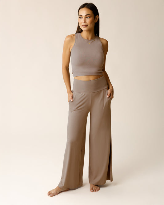 Woman wearing the Bamboo Wide Leg Maternity & Postpartum Lounge Pant in Taupe, paired with matching Sublime® Bamboo Maternity & Nursing Longline Bra Top@model_info:Lisa is 5'6" and wearing a Small.