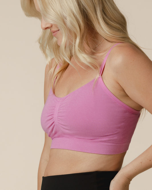 Side view of model wearing the Sublime® Bamboo Hands-Free Pumping Lounge & Sleep Bra in Soft Fuchsia@model_info:Maddy is wearing a Small.