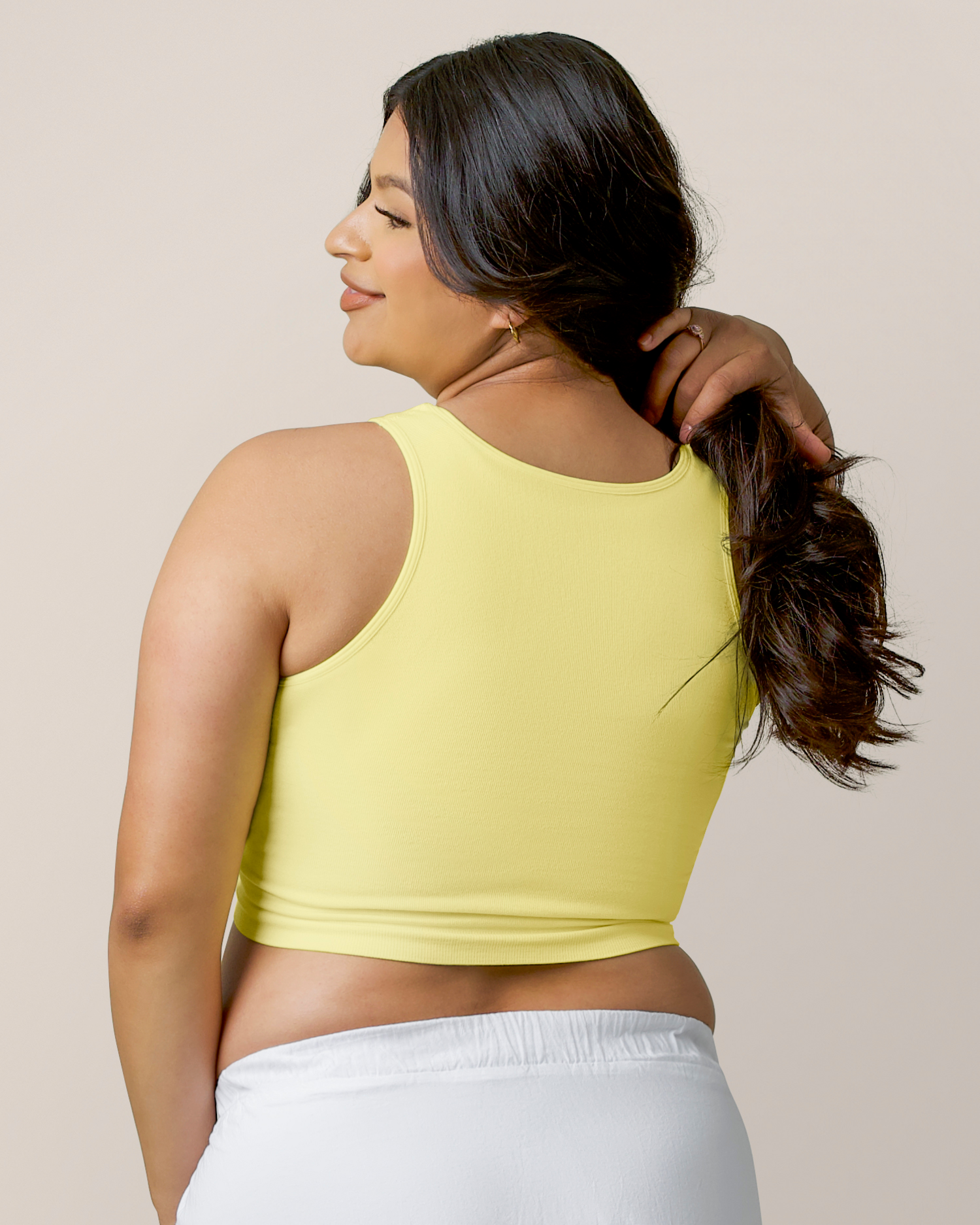 Back view of model wearing the Sublime® Bamboo Maternity & Nursing Longline Bra Top in Light Lemon
