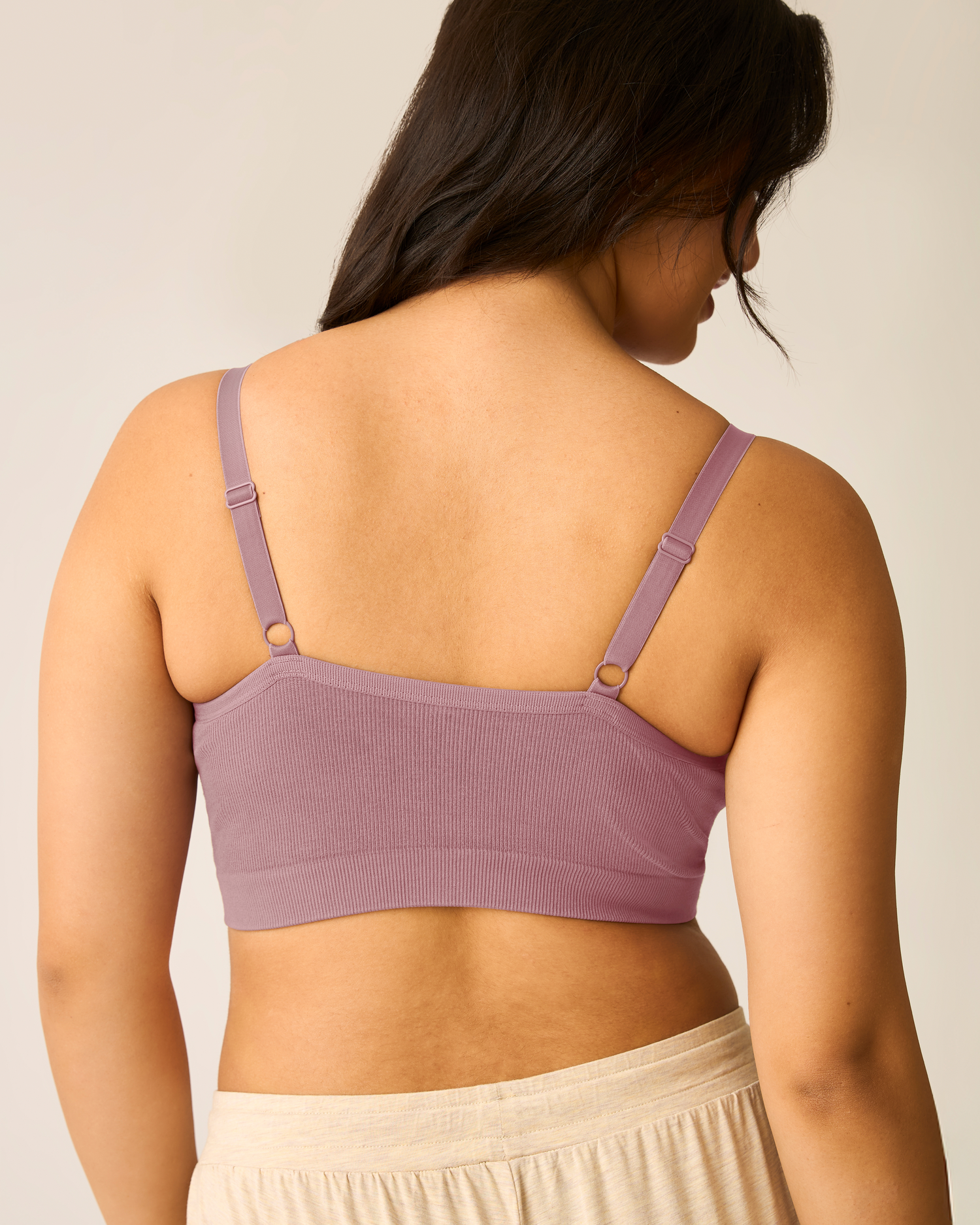 Woman wearing Sublime® Bamboo Hands-Free Pumping Lounge & Sleep Bra in Twilight against a neutral background